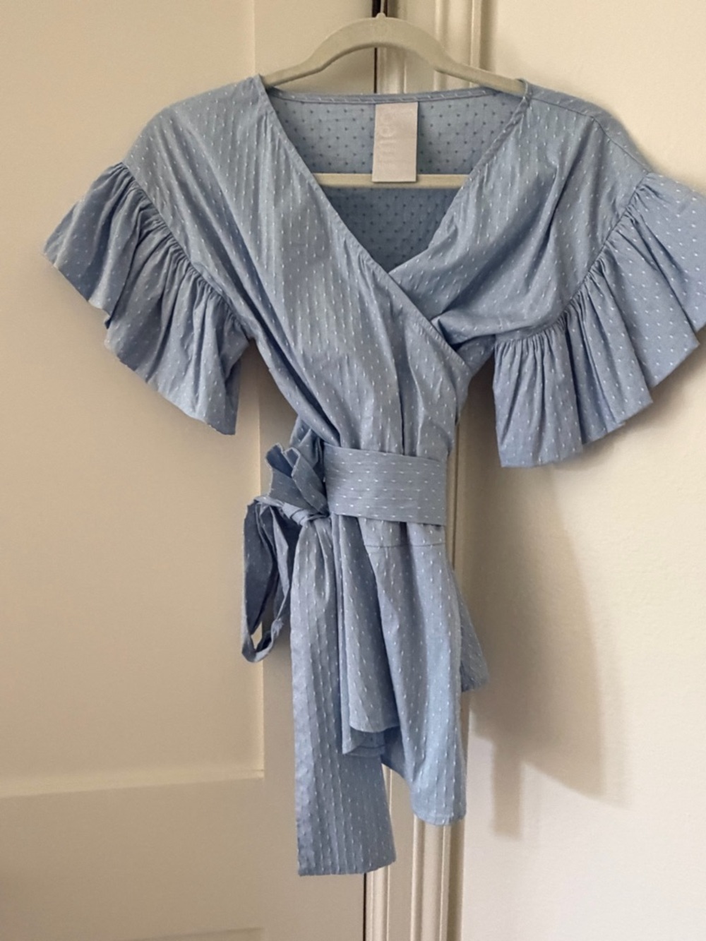 Light Blue Wrap Blouse with Ruffle Sleeves and Waist Tie